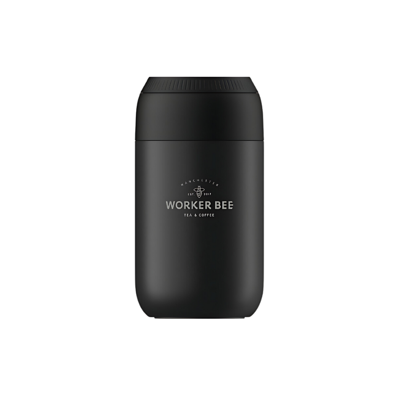 The Worker Bee Chillys Reusable Cup - Black (12oz) features a matte black finish, rounded top, and white Worker Bee Tea & Coffee logo with a bee graphic—an eco-friendly insulated cup ideal for keeping drinks hot or cold every day.