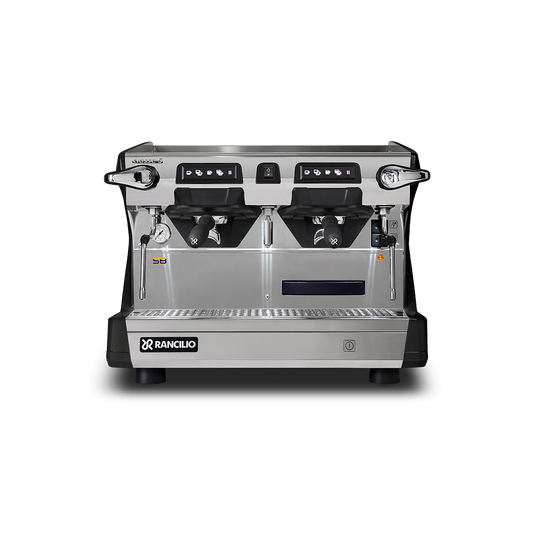 The BLACK Rancilio Classe 5 Compact 2 Group Tall Traditional Machine by Worker Bee Tea & Coffee features Steady Brew tech, dual group heads, two steam wands, and a drip tray, shown front-facing against a white background.
