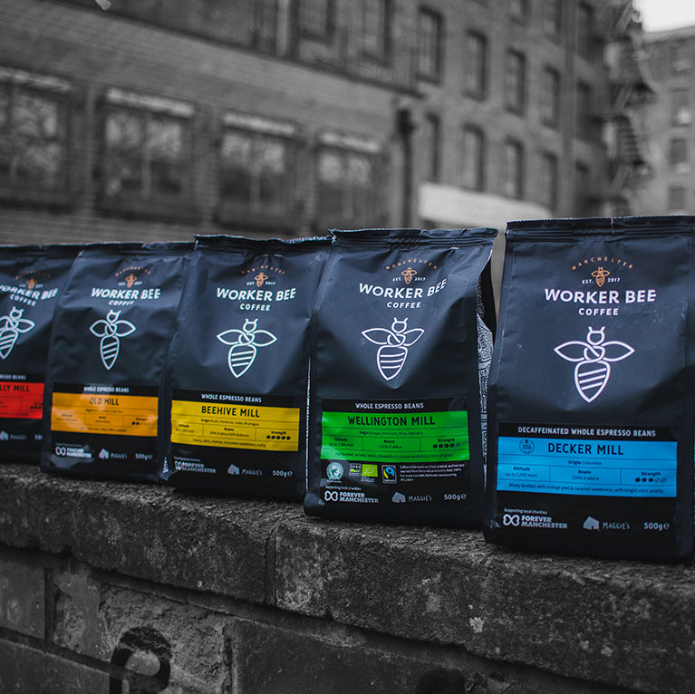 Worker Bee Coffee bags, Multiple Flavors on a wall