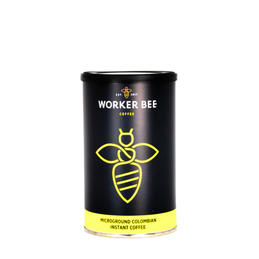 Black canister of Worker Bee Colombian Instant Coffee with yellow bee logo on a white background