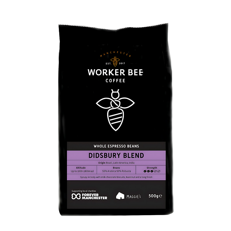 Black coffee bag with 'Manchester Worker Bee Coffee' branding and Didsbury Blend label on a white background