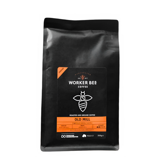 A black Worker Bee Tea & Coffee bag labeled Special Offer - Old Mill Ground for Cafetierre & Filter 227g Was £9.25 Now £6.94 features an illustrated bee logo and orange and white accents on a black background.